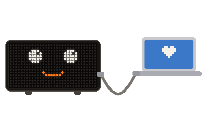 A PixelPop board plugged into a Mac with a cable