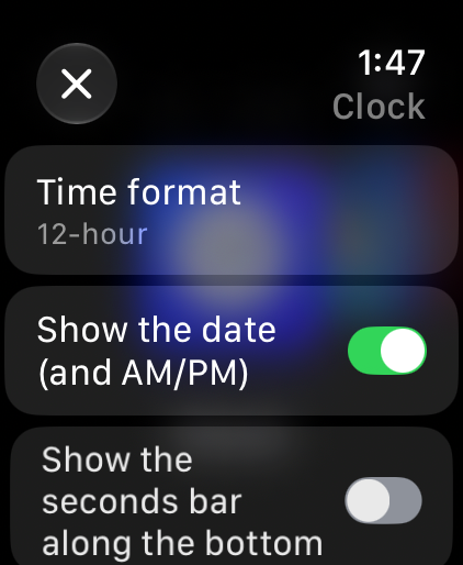 Clock quick settings: Time format 12-hour, Show the date (and AM/PM) switched on, Show the seconds bar along the bottom switched off
